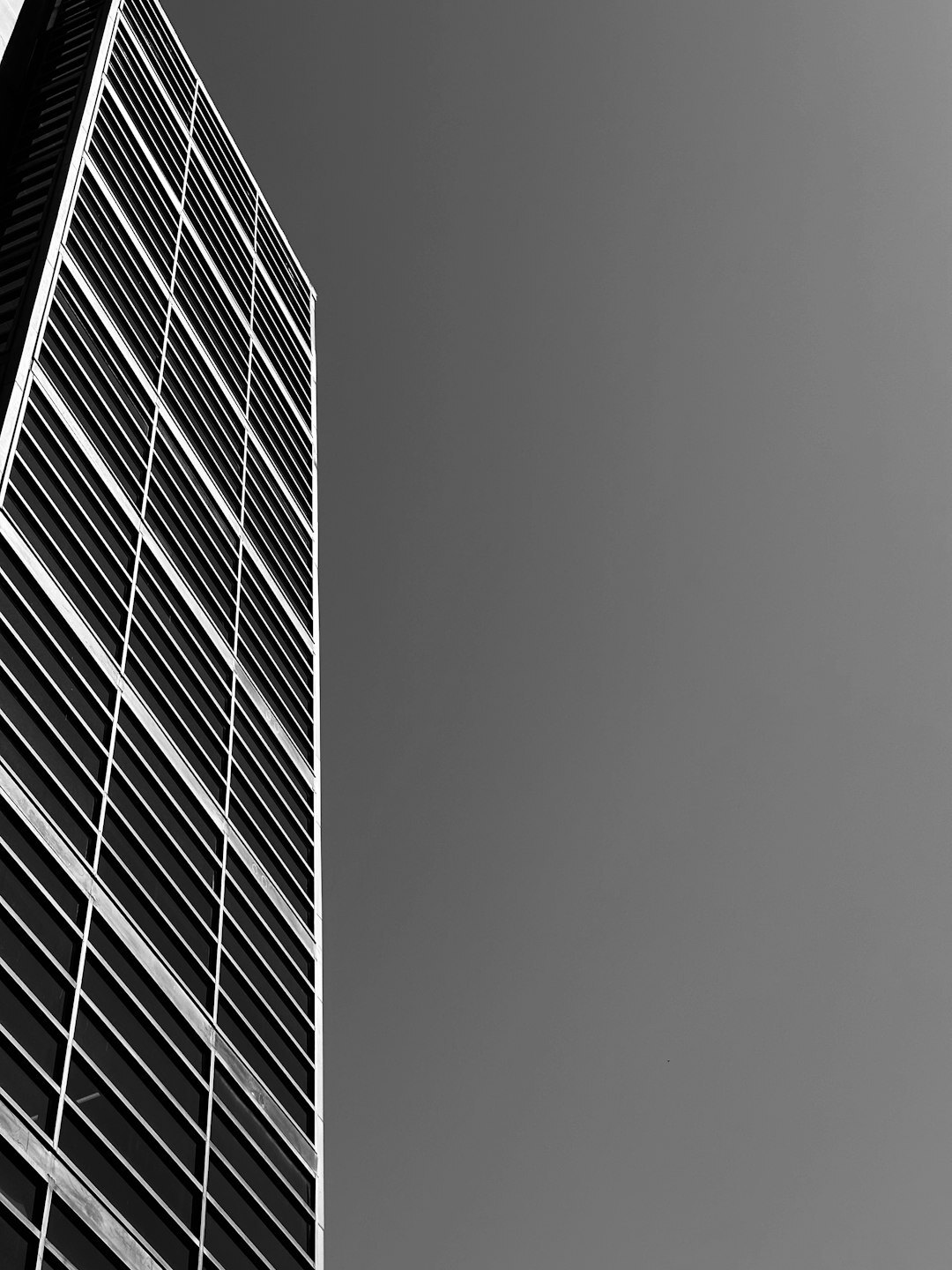 Modern office building exterior in Montevideo under a clear sky